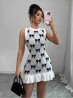 Robe mini moulante sans manches à col rond et volants pour femme, en maille, élégante et chic, idéale pour l'été