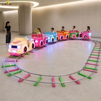 Train électrique miniature sur rail modulaire circulaire avec lumières LED multicolores pour parcs d'attractions intérieurs pour enfants, centres commerciaux, location