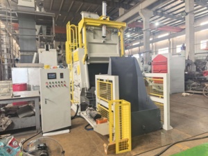 Machine de sablage à bande tournante à chargement et déchargement automatiques Q3210, Abrateur - Product Image 3