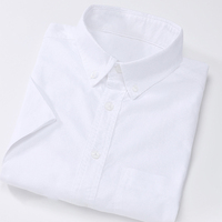 Grosir 100% katun klasik ODM & OEM kemeja lengan panjang warna Solid kancing bawah kerah kemeja Chemise dekontractee kemeja pria santai