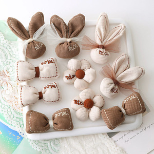 Accesorios de Moda Coreanos <span class=keywords><strong>para</strong></span> Otoño e Invierno, Diadema con Lazo Acolchado de Cinco Pétalos, Nueva Tela, con Bolsa <span class=keywords><strong>para</strong></span> Botas de Regalo - Product Image 1