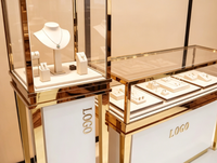 Vitrine à bijoux en acier inoxydable de luxe avec éclairage LED, comptoir d'exposition pour bijouterie, mobilier de magasin, aménagement personnalisé pour salle d'exposition