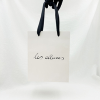 Vente en gros de sacs à poignée de luxe imprimés sur mesure recyclables emballage de détail ruban vêtements cadeaux en fourrure avec logo de marque artistique