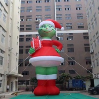 Ballon gonflable géant Zhenmei de 50 pieds, monstre vert Grinch, avec ventilateur intégré et installation facile, tenant une boîte cadeau