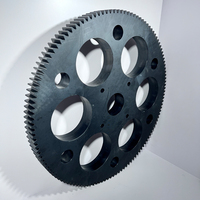 Engrenage robuste en nylon MC noir résistant aux chocs avec service de découpe d'épaisseurs de 5 mm à 50 mm pour la manutention des matériaux de machines de construction