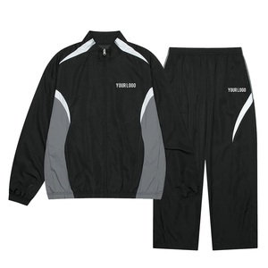 Survêtement unisexe Healy noir à blocs de couleur, fermeture éclair intégrale, col montant, design sportif avec poches latérales, matière polyester à séchage rapide - Product Image 1