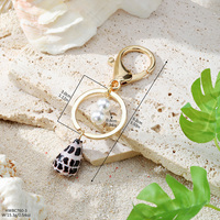 Charme de sac exquis, style hawaïen, perle, coquille de beurre, accessoire, pendentif pour sac à main, porte-clés pour cadeau