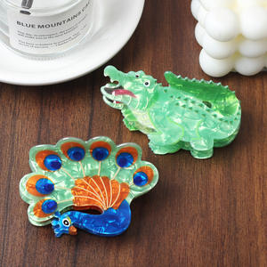 กิ๊บติดผมรูปนกยูงหงส์ดำ ดีไซน์หรูหรา พร้อมจำหน่ายราคาส่งและรับสั่งทำ - Product Image 1