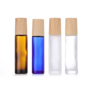 10ml claro âmbar claro azul vidro rolo de óleo essencial em garrafa com tampa de madeira 10g vidro fosco garrafas de bola