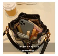 Sac à bandoulière grande capacité tendance et personnalisé en PU pour femme, nouveau sac seau à cordon mignon et texturé avec motif dessin animé