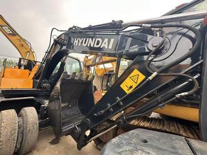 รถขุดไฮดรอลิกแบบล้อ Hyundai Robex 150W-9 R150W-9 มือสองคุณภาพสูง พร้อมชิ้นส่วนประกอบมอเตอร์เครื่องยนต์ดีเซลและตลับลูกปืน - Product Image 3