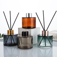 Bouteilles en verre de diffuseur de roseau de luxe colorées personnalisées de 50ml 100ml 150ml 200ml Bouteilles rondes d'arôme parfumé avec bâtons
