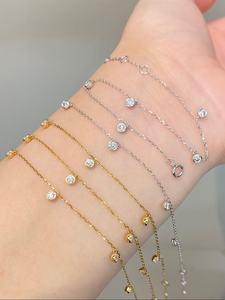 Xinfly Famous Brand Custom Trendy 18k Pure Gold Round Permanent Amour 0.35CT Natural Diamond Station <b>Bracelets</b> Bezel Set Charm - Product Image 1