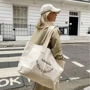 2023 nueva bolsa de lona de algodón reciclado Natural Extra grande lisa con impresión de logotipo para compras viajes al aire libre