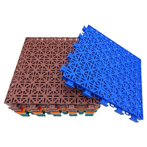 Dalles de sol sportives en PP à emboîtement pour terrains de basketball intérieurs et extérieurs, respectueuses de l'environnement, avec logo personnalisé et lignes de terrains. - Product Image 1