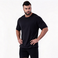 T-shirt uni noir pour homme, coupe classique, col rond, tricoté, 100 % coton, écologique, vente en gros directe usine