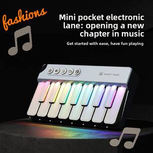 Clavier électronique arc-en-ciel en bambou pour tout-petits, piano musical lumineux avec plusieurs sons, cadeau éducatif précoce unisexe - Product Image 2