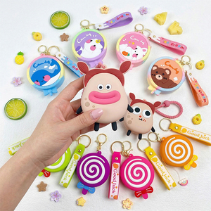 Porte-monnaie rond en silicone avec logo personnalisé, motif monstre moche 3D kawaii, dessin animé, porte-clés, rangement pour écouteurs, cadeau pour enfants, vente en gros - Product Image 1