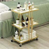 Chariot roulant moderne de luxe à 3 niveaux avec roues en métal doré - Polyvalent pour salon de coiffure, maison, bureau et utilisation en extérieur