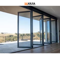 AS2047 NFRC Porte battante en aluminium à double vitrage Balcon Extérieur Aluminium Porte coulissante Bi Pliante