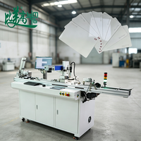 Machine de production à fonctionnement continu avec séparation de cartes, alimentation, encodeur RFID, marquage laser à fibre, inspection OCR et rejet pneumatique