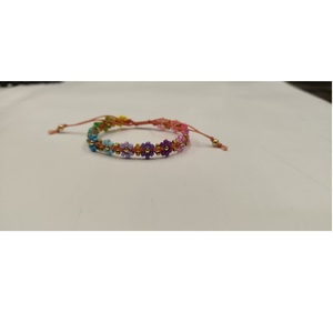 Bracelet artisanal Sstringz en perles Miyuki Delica violet lavande avec motif géométrique doré et turquoise, bijoux bohèmes ajustables - Product Image 1
