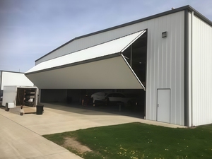 <span class=keywords><strong>Porte</strong></span> de <span class=keywords><strong>hangar</strong></span> verticale à double pliage à <span class=keywords><strong>prix</strong></span> d'usine, <span class=keywords><strong>porte</strong></span> de <span class=keywords><strong>hangar</strong></span> d'avion isolée avec système de déneigement automatique - Product Image 6