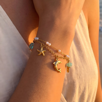 Pulsera de Acero Inoxidable de Doble Capa con Dijes de Delfín y Estrella de Mar, Chapada en Oro PVD de 18K, Resistente al Deslustre, Joyería Impermeable para Viajes a la Playa