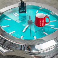 Table basse contemporaine élégante en acier inoxydable pour salon meubles de maison avec présentoirs en verre de montre en métal