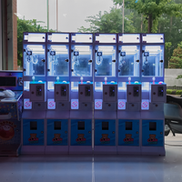 Vente directe usine Mini machine à griffes à monnayeur pour cadeaux et poupées, en métal