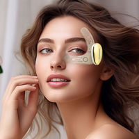 Masseur oculaire portable en forme de V, tête de contact ovale dorée, patch adhésif flexible, outil de soin des yeux