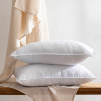Oreiller de lit en polyester non tissé pour hôtel, avec logo personnalisé et soutien cervical, vente en gros