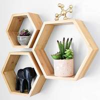 Étagères flottantes hexagonales multifonctionnelles en bambou OEM Sac à épices mural en bois alvéolé pour la cuisine Outil alimentaire vivant