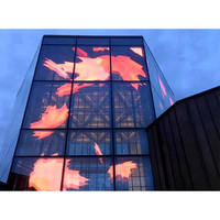 Pantalla LED de Malla Transparente Flexible para Exteriores, Resistente al Agua IP45, Video Wall para Fachadas de Edificios