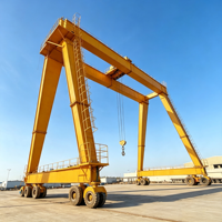 Grue portique robuste de 40 tonnes sur pneus avec moteur et boîte de vitesses, direction pivotante à 90° pour la manutention de conteneurs portuaires