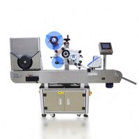 Machine d'étiquetage automatique TEBAK pour bouteilles rondes, positionnement horizontal avant et arrière, étiquetage auto-adhésif, spéciale cave à vin