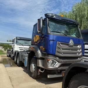 Camion tête motrice d'occasion bleu foncé, poids lourd 70 tonnes, HOWO NX 371 ch 6*4, pour le port d'Abidjan, <span class=keywords><strong>Côte</strong></span> d'Ivoire - Product Image 1