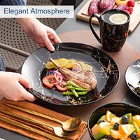 LOVECASA Assiettes et bols noirs pour 4 personnes, Service de table en porcelaine 16 pièces, Ensemble de vaisselle en céramique avec glaçure dorée, Assiettes rondes