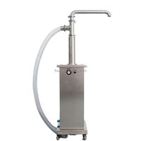 Machine de remplissage et de dosage verticale pour crèmes cosmétiques, sauces, confitures, miel, beurre, onguents, shampoings, liquides et eaux en flacons et seringues