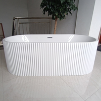 Baignoire autoportante en acrylique blanc de luxe Baignoire ovale et ellipse à rayures verticales avec rainure en V cannelée portable pour une utilisation en hôtel