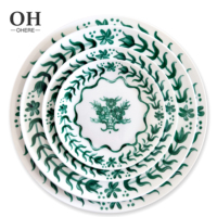Ensemble de vaisselle en porcelaine de Chine osseuse de qualité supérieure fleur verte de Style occidental pour la décoration de plaque de chargeur Vajilla écologique pour