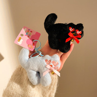 Nouveau porte-clés chien en peluche avec lunettes et cœur, design original, pour décoration de sac à dos