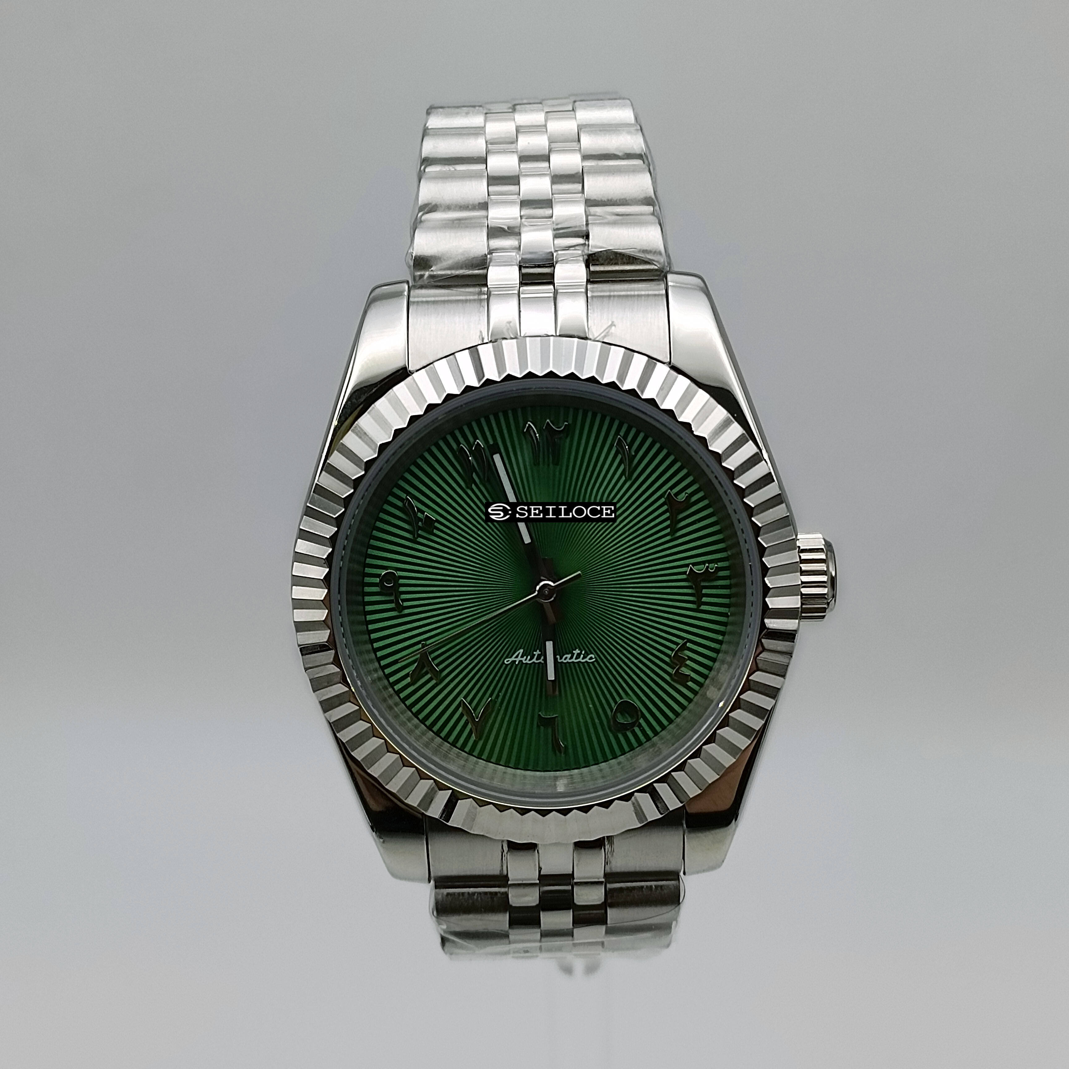 ตัวเรือนสีเงิน+หน้าปัดสีเขียว