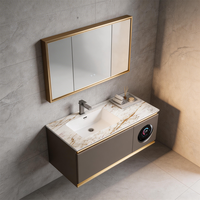 Meuble-lavabo flottant haut de gamme avec éclairage d'ambiance intégré, lavabo, miroir lumineux et design élégant avec finition dorée