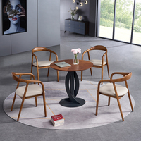 Neues Konferenztisch- und Stuhlset im chinesischen Stil aus Massivholz, mit einer runden, eingelegten Tischplatte und Metallgestell.