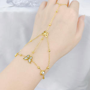 Bracelet chaîne en acier inoxydable avec pendentif œil bleu, chaîne de doigt, chaîne de poignet, forme de squelette, motif floral - Product Image 1