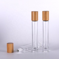 Fond épais de bouteille de rouleau d'acier de verre clair de 10ml avec la conception ronde et carrée de chapeau en bambou