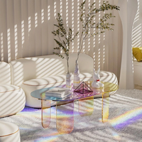 Table basse ovale en acrylique irisé Kainice, miroir signature, support de présentation unique pour salon moderne, décoration arc-en-ciel brillante pour la maison