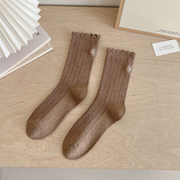 Chaussettes de luxe à volants brodés de motifs floraux de qualité Chaussettes à volants avec logo brodé personnalisé