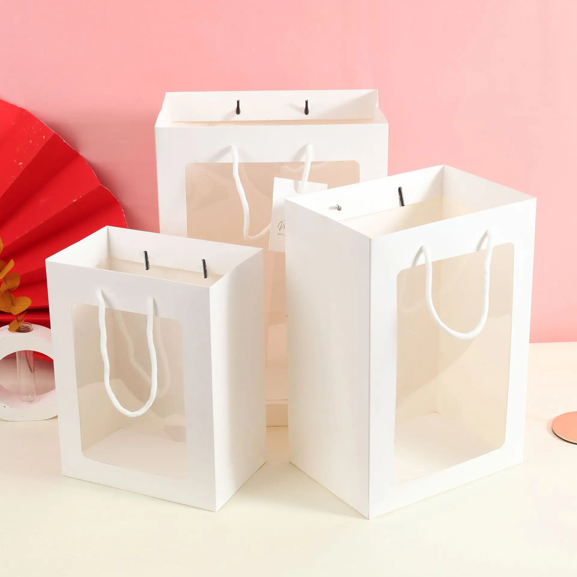 Biodegradable luxury brand custom logo shoe boutique pink packaging gift paper shopping bag for clothes gift flower